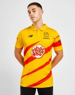 New Balance The Hundred Trent Rockets Polo Shirt Gul